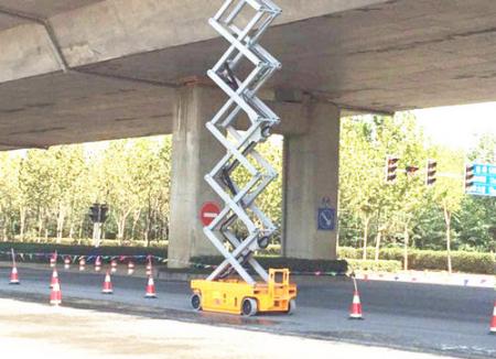 Scissor Lift Work for bridge maintenance